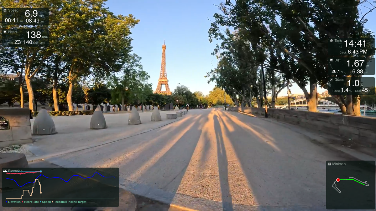 TerraFlo route playback: a Paris run toward the Eiffel Tower with live speed, heart rate, time, distance, and grade overlays